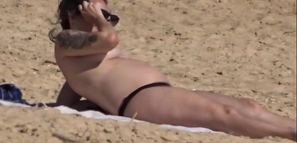  Beautiful busty pregnant topless at the beach 05